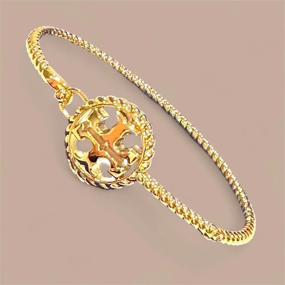 TORY BURCH ROPE HINGED 18KGOLD OVER BRASS BRACELET